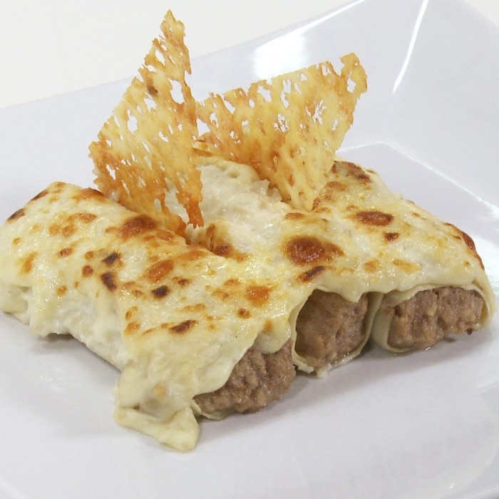 Cannelloni de bœuf avec sauce béchamel aux cèpes et fromage manchego